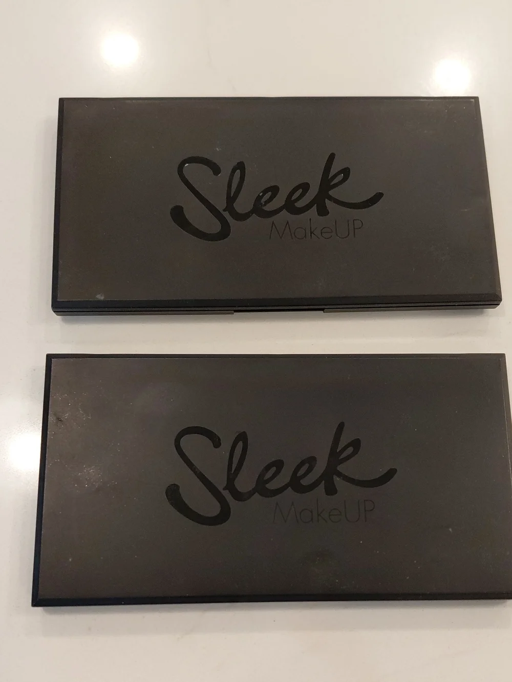 Two Sleek Makeup Eyeshadow Palettes— Classic Black Finish With Perfect Colors.